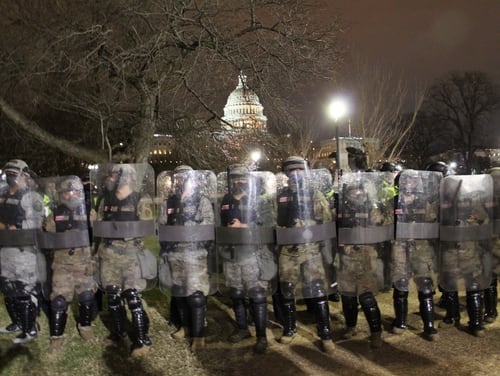 D.C. National Guard arrive to push back protesters from the Capitol on Jan. 6, 2021. (Kyle Rempfer/Staff)