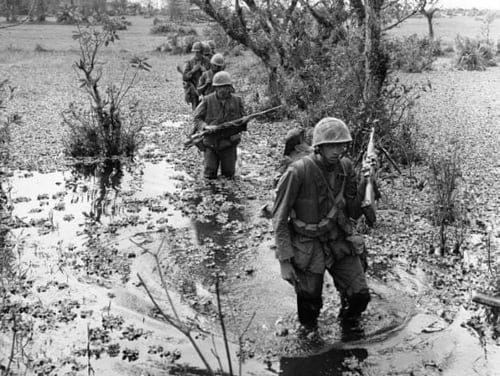 Marines on patrol in Vietnam in March 1967. James Stogner, the fourth Marine in the patrol, was awarded the Navy Cross for heroism during the Vietnam War. (Courtesy photo)