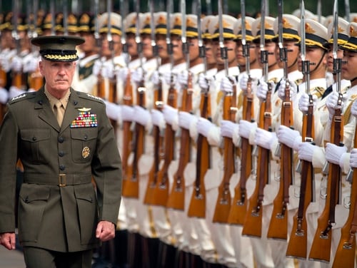 Joint Chiefs Chairman Gen. Joseph Dunford reviews a Chinese honor guard during a welcome ceremony at the Bayi Building in Beijing, Tuesday, Aug. 15, 2017. (Mark Schiefelbein/AP via Pool)