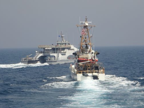 Iran’s Islamic Revolutionary Guard Corps navy Harth 55, left, conducted an unsafe and unprofessional action by crossing the bow of the Coast Guard patrol boat Monomoy April 2 as the U.S. vessel was conducting a routine maritime security patrol in international waters of the southern Arabian Gulf. (Navy)