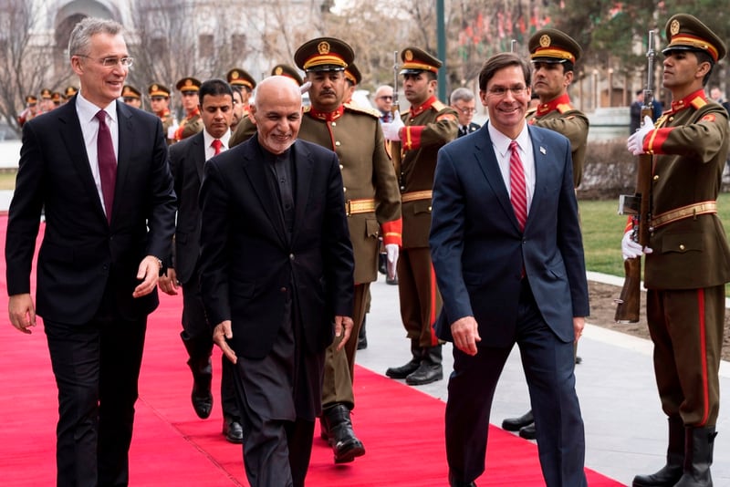 From left: NATO Secretary General Jens Stoltenberg, Afghanistan President Ashraf Ghani and U.S. Secretary of Defense Mark Esper prepare to speak in Kabul on Feb. 29, 2020, regarding a joint declaration that could result in all foreign troops leaving Afghanistan within 14 months. (NATO)