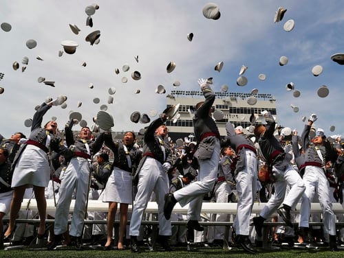 West Point graduates toss their caps into the air at the end of graduation ceremonies at the United States Military Academy, Saturday, May 26, 2018, in West Point, N.Y. (Julie Jacobson/AP)