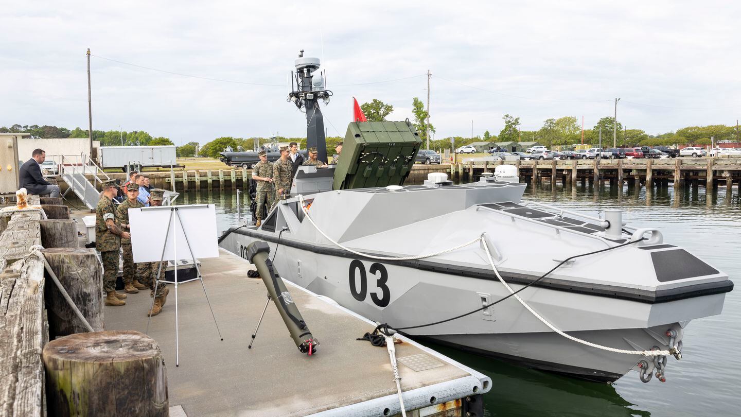 U.S. Marine Corps officials review the capabilities of the Long-Range Unmanned Surface Vessel at Joint Expeditionary Base Little Creek-Fort Story, Va., on April 27, 2023. (Sgt. Kealii De Los Santos/U.S. Marine Corps)