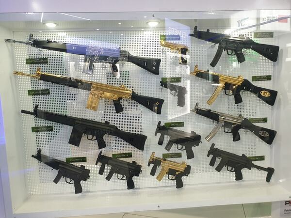A Pakistani booth shows off gold-plated guns at IDEX 2021. (Agnes Helou/Staff)