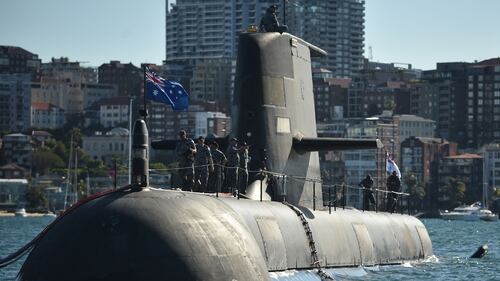 The Royal Australian Navy's HMAS Waller (SSG 75), a Collins-class diesel-electric submarine, is seen in Sydney Harbour on November 2, 2016. Australia on April 2016 awarded French contractor DCNS, now Naval Group, the main contract to design and build its next generation of submarines to replace its current fleet of six Collins-class vessels. The company is now negotiating the strategic partnering agreement, which is a critical step toward building the diesel-electric boats. (Photo credit should read PETER PARKS/AFP/Getty Images)