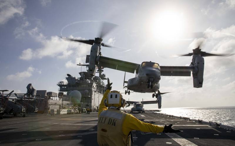 Aviation Boatswain’s Mate (Handling) 2nd Class Skyler Campbell directs a Marine Corps MV-22 Osprey on Jan. 23, 2021, during takeoff from the amphibious assault ship USS Makin Island (LHD 8) in the Indian Ocean.