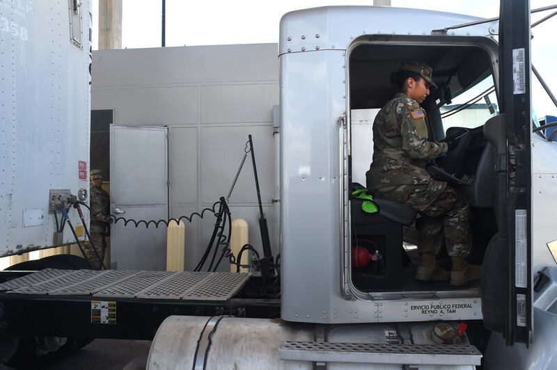 Army Pfc. Amber Popp, a patient administrative specialist with the Texas Army National Guard’s F Company, 536th Brigade Support Battalion, inspects a semi-truck for illegal drugs and other prohibited items on Aug. 21, 2018, while working with U.S. Customs and Border Protection agents at the Customs and Border Protection’s Pharr Port of Entry inspection station in Pharr, Texas. (Sgt. 1st Class Jon Soucy/Army)
