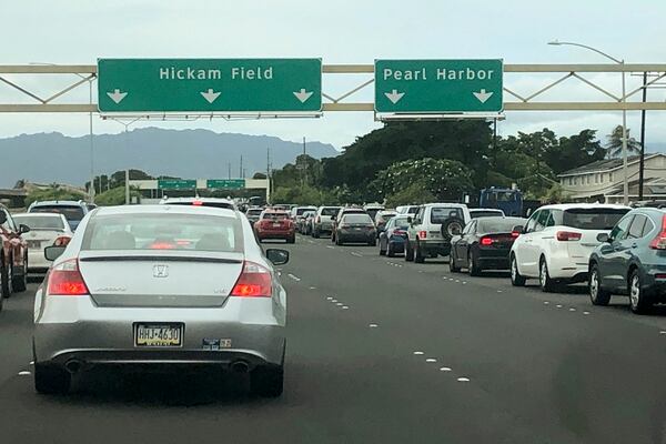 Traffic backs up at the main gates after a shooting at Pearl Harbor Naval shipyard, Wednesday, Dec. 4, 2019, near Pearl Harbor in Honolulu. (Caleb Jones/AP)