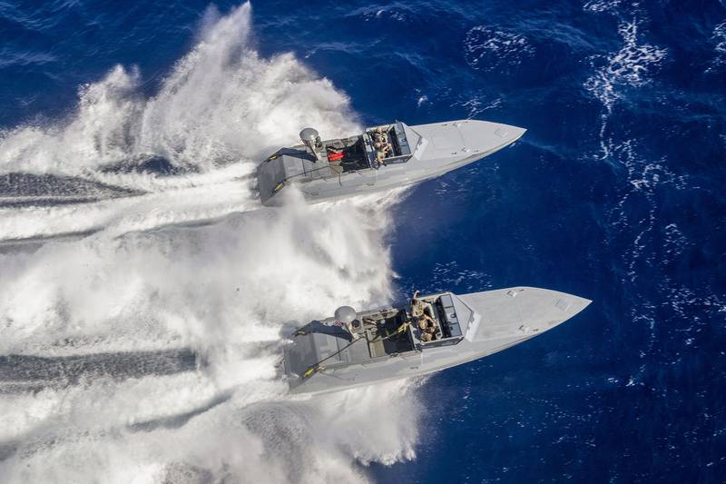 Sailors on combat craft assault (CCA) conduct small boat operations with the Expeditionary Sea Base USS Hershel "Woody" Williams (ESB 4) on Aug. 27, 2020, in the Mediterranean Sea.