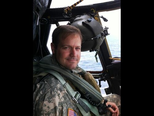 Now-retired Army CW5 Doug Englen in an MH47 helicopter about to fly from ship in undisclosed location on classified mission. (Courtesy of Doug Englen)