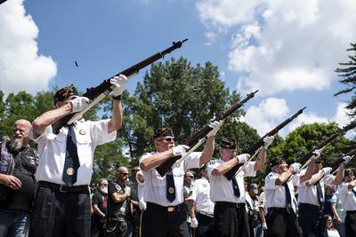 Veterans perform a gun salute during his memorial service of Vietnam War veteran Wayne Wilson at the Silverbrook Cemetery in Niles, Mich., Wednesday, July 17, 2019.