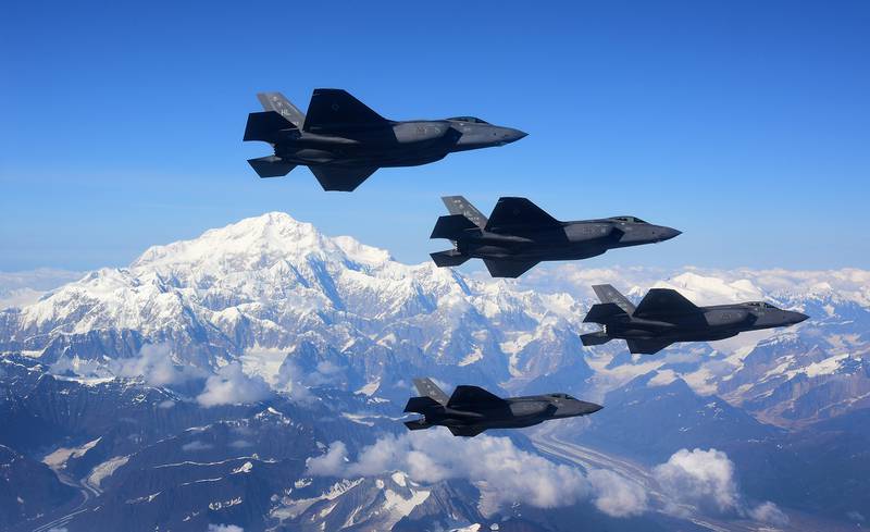 Four F-35A Lightning IIs fly in formation over Denali National Park, Alaska, Aug. 17, 2020.