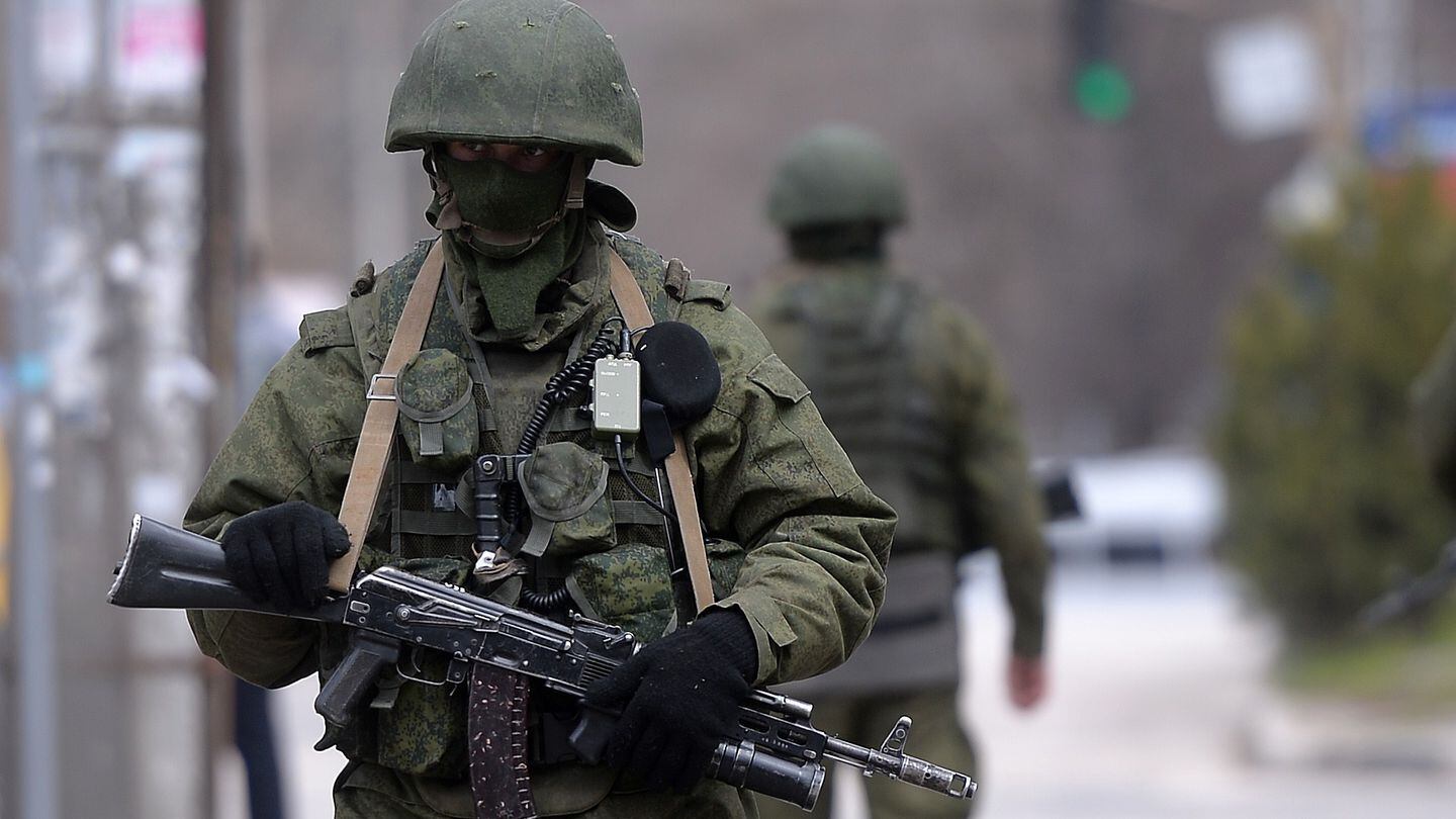Russian soldiers patrol outside the naval headquarters in Simferopol on March 19, 2014. Russia's Constitutional Court unanimously backed President Vladimir Putin's move to make Crimea part of Russia. (Filippo Monteforte/AFP via Getty Images)