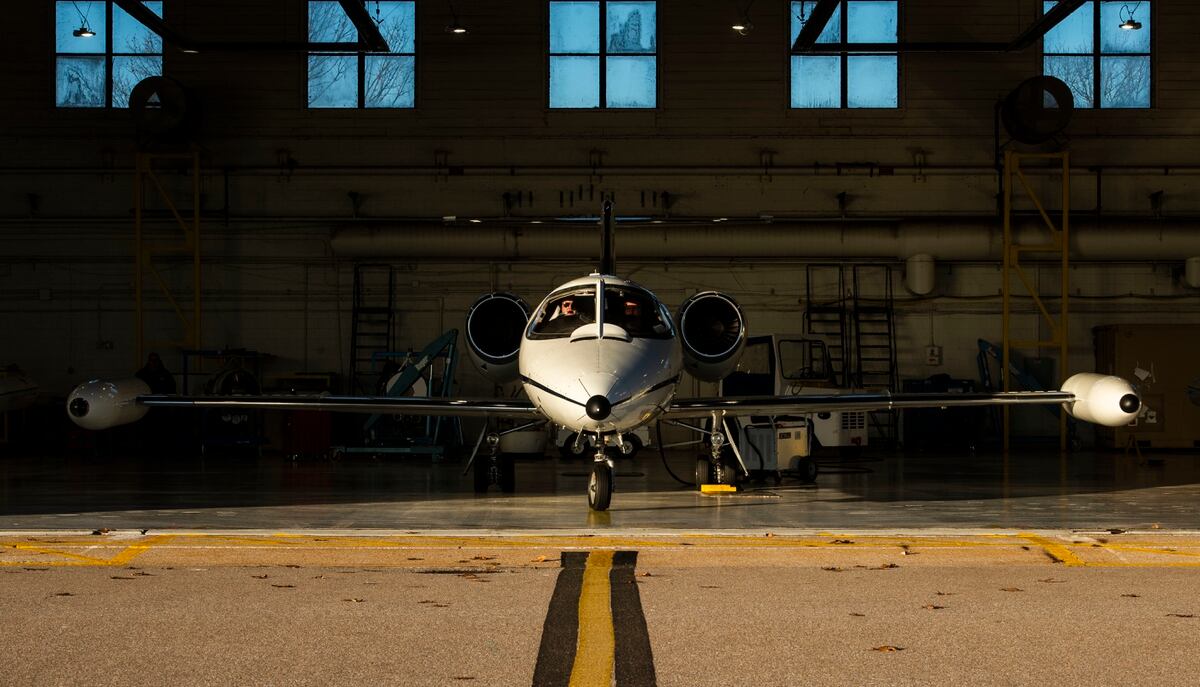 A C-21 aircraft awaits takeoff outside a 458th Airlift Squadron hangar before a training flight on Dec. 17, 2018, at Scott Air Force Base, Ill. Image: Senior Airman Daniel Garcia/U.S. Air Force