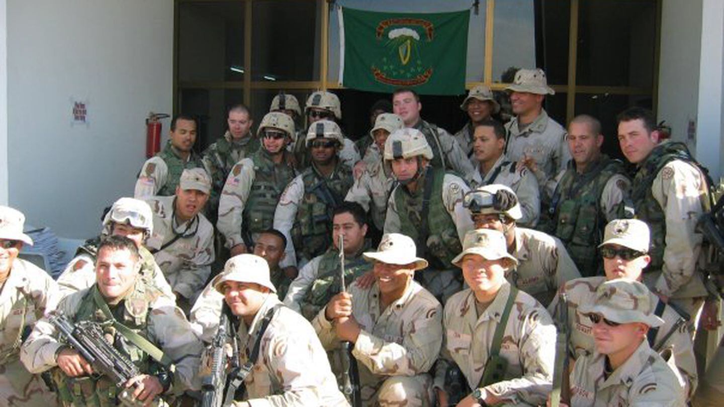 Combined New York Army National Guard unit at a memorial service for two New York soldiers who were killed in action, Baghdad, Iraq, December 2004. (Photo courtesy of John Byrnes)