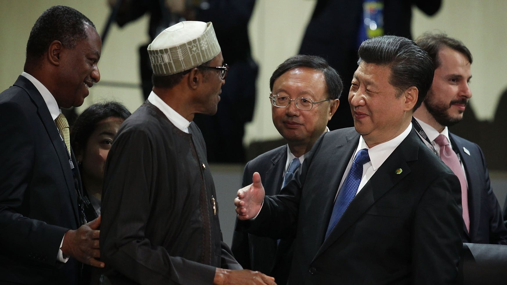 Chinese President Xi Jinping, right, greets Nigerian President Muhammadu Buhari during a plenary session of the 2016 Nuclear Security Summit on April 1, 2016, in Washington, D.C. The summit was organized to highlight accomplishments and make new commitments toward reducing the threat of nuclear terrorism. (Alex Wong/Getty Images)