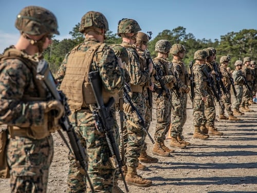 Marines listen to instructions for table three at Range K501, Marine Corps Base Camp Lejeune, North Carolina, Oct. 17, 2019. (Pfc. Leslie Alcaraz/Marine Corps)