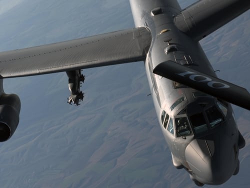 An Air Force B-52 Stratofortress from the 2nd Bomb Wing at Barksdale Air Force Base, La., breaks away from a KC-135 Stratotanker from RAF Mildenhall over Romania, March 1. The KC-135 mission supported supported the B-52 Stratofortress deployed to Europe as part of the Bomber Task Force rotation. (Senior Airman Benjamin Cooper/Air Force)