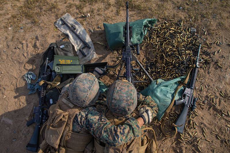 Marines fire an M240B machine gun during a team defense range as part of MEFEX 21.1 at Fort Drum, N.Y., Nov. 6, 2020.