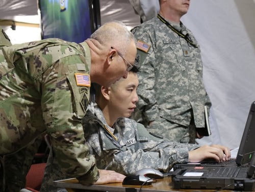 The Army is integrating cyber and electronic warfare planners into brigade staffs. (Kristen Kushiyama/Army)