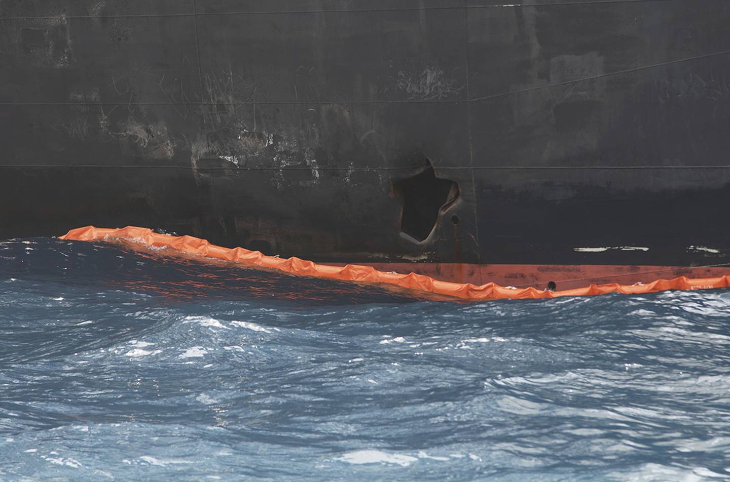 A hole the U.S. Navy says was made by a limpet mine is seen on the damaged Panama-flagged, Japanese owned oil tanker Kokuka Courageous