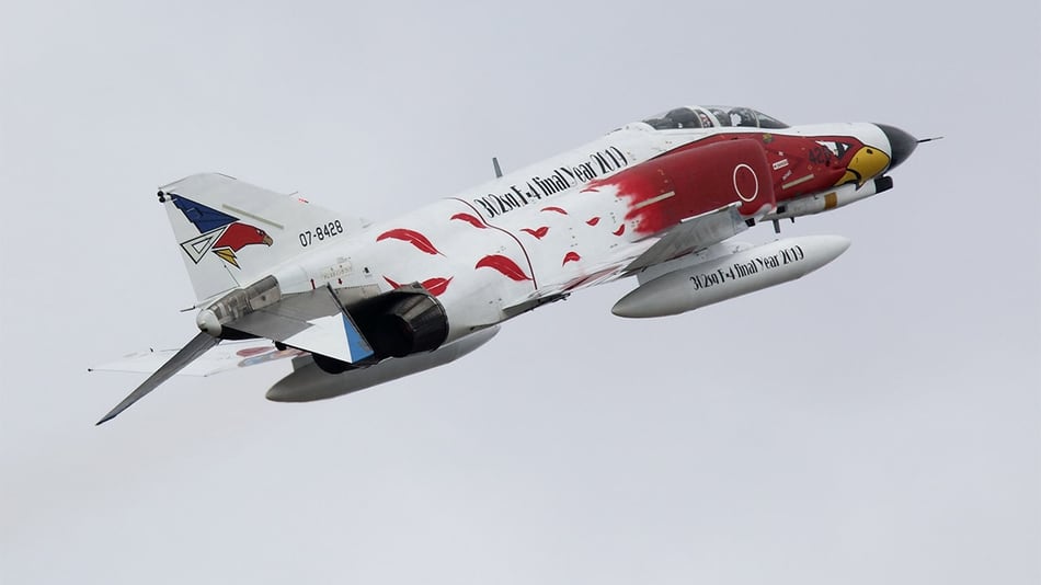 To commemorate 302 Squadron transitioning to the F-35, a pair of the unitâs Phantoms were given special commemorative paint schemes, one in a black base coat and the other in white, as shown here during an air show held at the base in early December. (Mike Yeo/Staff)
