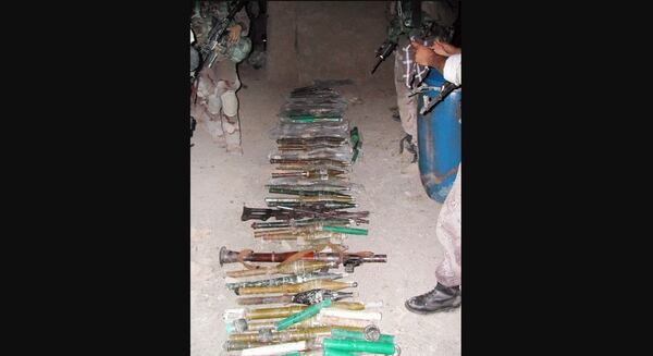 Cache of weapons confiscated in Fallujah by Staff Sgt. David Bellavia and his unit. (Army)