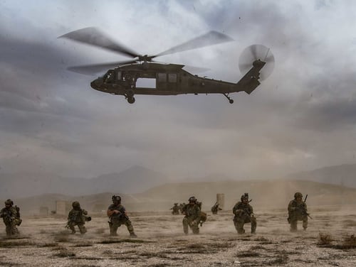 U.S. service members secure the perimeter at an undisclosed location in Afghanistan in support of Operation Resolute Support on March 17, 2020. (Staff Sgt. Joel Pfiester/Air Force)