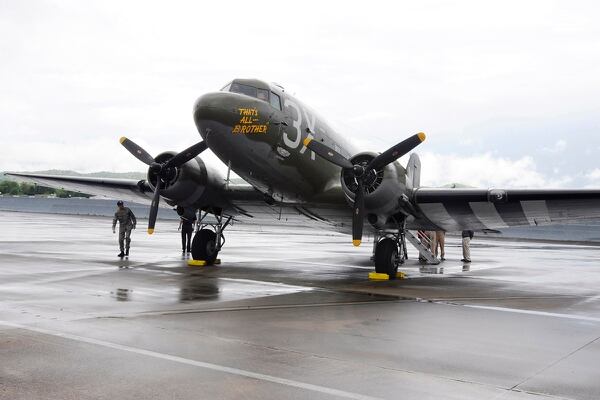 In this April 9, 2019, photo, the World War II troop carrier That's All, Brother sits on an airport tarmac during a stop in Birmingham, Ala. The World War II aircraft that took part in the D-Day invasion in 1944 is returning to Europe for the 75th anniversary of the battle in June. (Jay Reeves/AP)