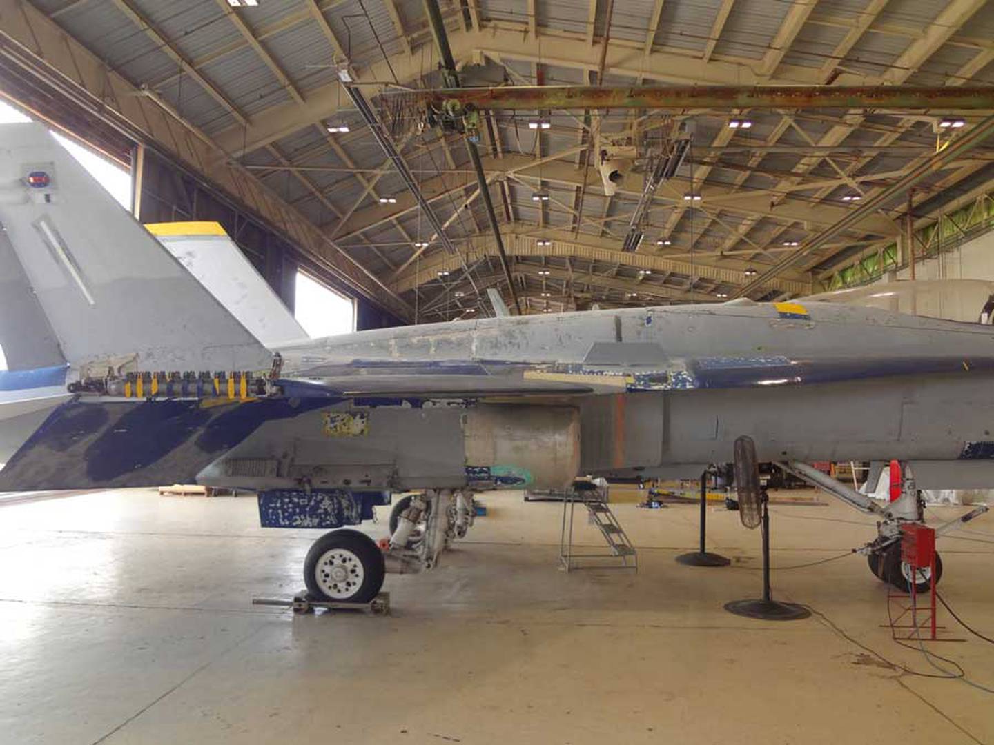 The F/A-18 Hornet Mark Fox flew when he faced a MiG during Operation Desert Storm being restored to display at the Naval Aviation Museum in Pensacola.