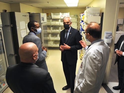 VA Secretary Denis McDonough tours a pharmacy storage area at the VA medical center in Washington, D.C., while receiving a briefing from local officials about coronavirus protocols on Feb. 10, 2021. (Robert Turtil/Veterans Affairs)
