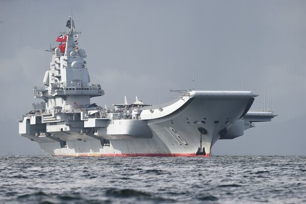The Chinese aircraft carrier Liaoning arrives in Hong Kong waters on July 7, 2017, less than a week after a high-profile visit by Chinese President Xi Jinping. (Anthony Wallace/AFP via Getty Images)