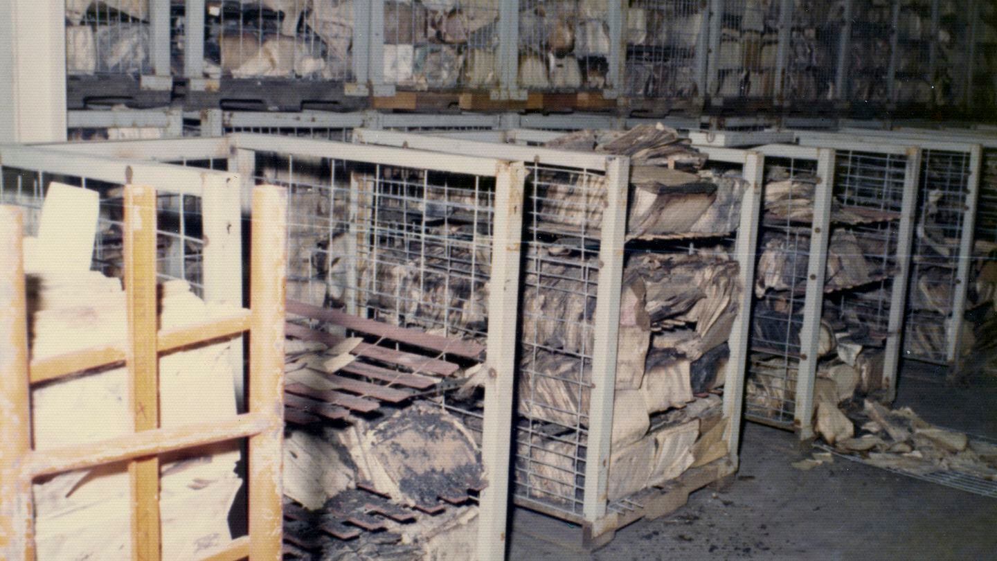 This photo provided by the National Archives and Records Administration shows damaged records after a massive fire at the Military Personnel Records Center in Overland, Mo., near St. Louis, which started on July 12, 1973. (National Archives via AP)