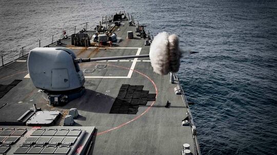 The destroyer USS Oscar Austin (DDG 79) fires its Mark 45 5-inch gun during a live-fire exercise in the Arctic Circle, Sept. 12, 2017. (Mass Communication Specialist 2nd Class Ryan U. Kledzik/Navy)