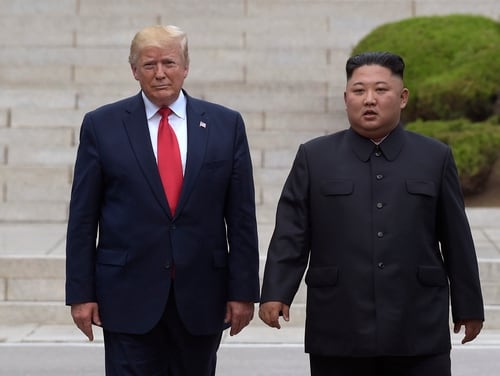 In this June 30, 2019, file photo, U.S. President Donald Trump, left, meets with North Korean leader Kim Jong Un at the North Korean side of the border at the village of Panmunjom in Demilitarized Zone. (Susan Walsh/AP)