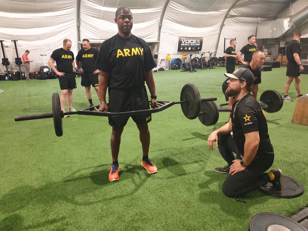 Army says fitness plan cut injuries and drug use, aids mental health