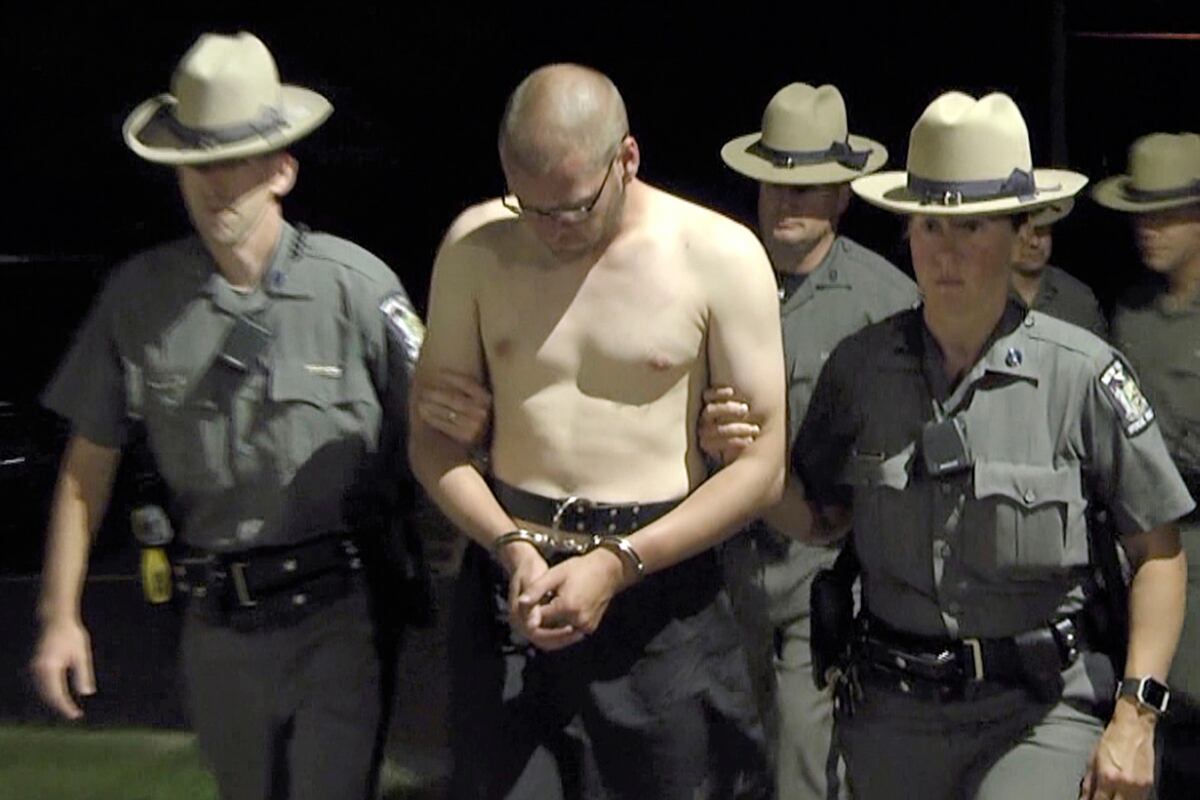 Soldier charged with killing NY trooper after shooting wife