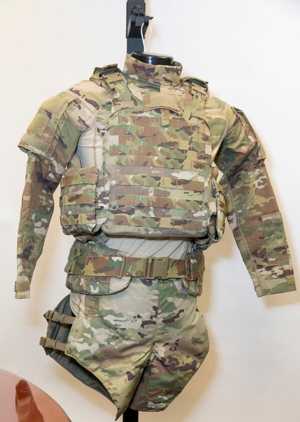 PEO Soldier shows new Soldier Protection System equipment at PEO Soldier in Fort Belvoir, Va., last year. Equipment includes Torso and Extremity Protection, Army Combat Shirt with built-in elbow pads, yoke, and shoulder protection, Integrated Head Protection System, and Transition Combat Eye Protection. (Alan Lessig/Staff)