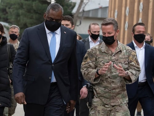 Secretary of Defense Lloyd Austin, left, walks with the commander of NATO’s Resolute Support Mission and U.S. Forces – Afghanistan, Army Gen. Scott Miller, at Resolute Support Headquarters, Kabul, Afghanistan, March 21, 2021. (Lisa Ferdinando/DoD)