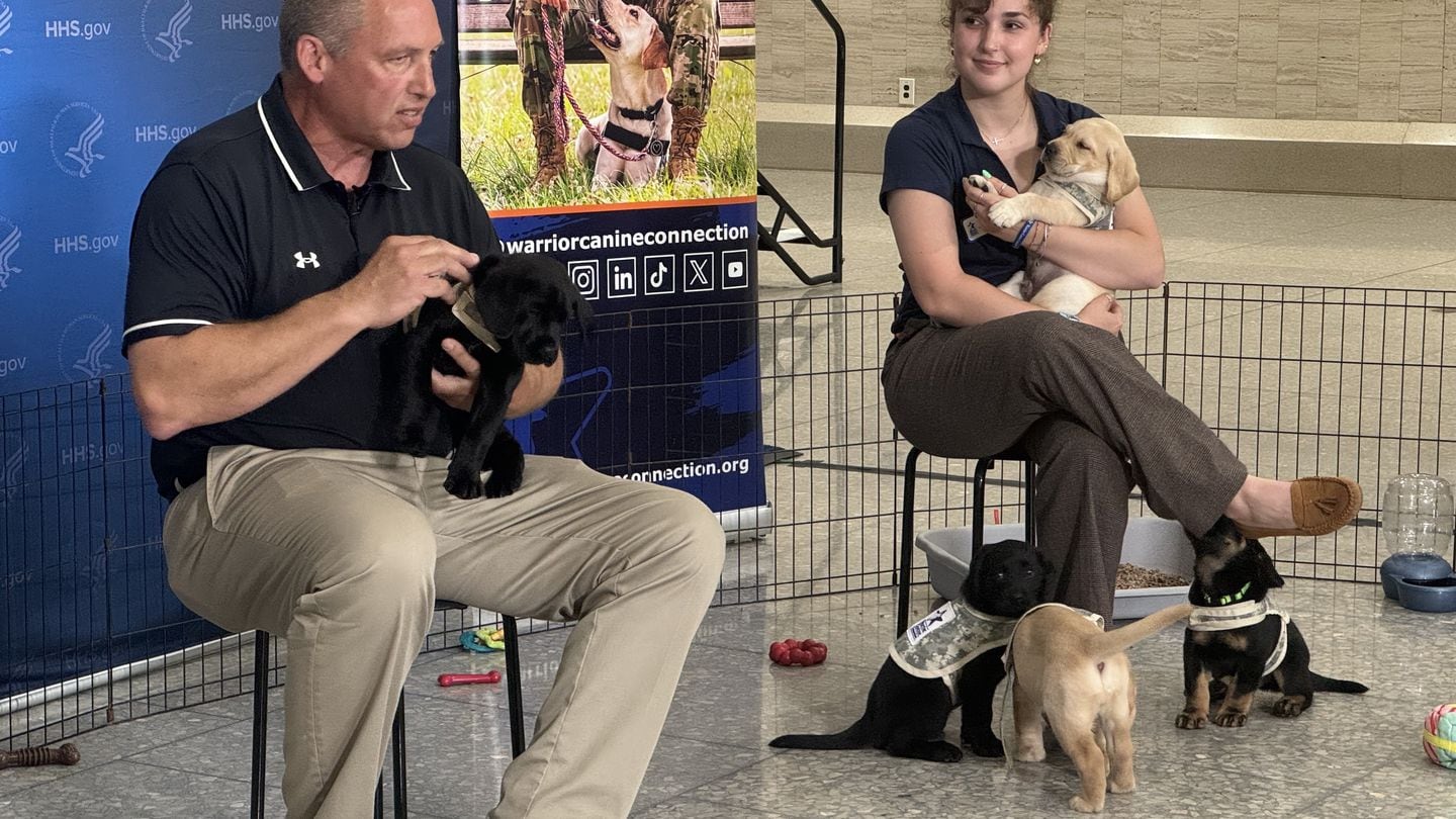 Rick Yount, the executive director of Warrior Canine Connection, explains the healing power of dogs during an event at the Department of Health and Human Services in Washington, D.C., May 8, 2024. (Jonathan Lehrfeld/Military Times)