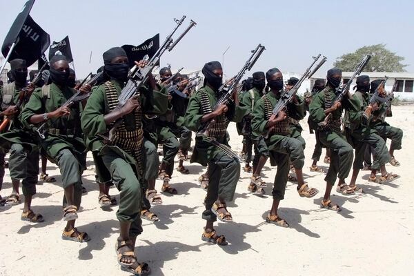 In this file photo from Feb.17, 2011, hundreds of newly trained al-Shabaab fighters perform military exercises in the Lafofe area some 18 km south of Mogadishu, Somalia. (Farah Abdi Warsameh/AP)