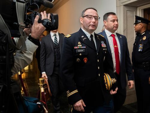 National Security Council aide Lt. Col. Alexander Vindman, left, leaves Capitol Hill as they conclude a public impeachment hearing of President Donald Trump in Washington on Nov. 19, 2019. (Manuel Balce Ceneta/AP)