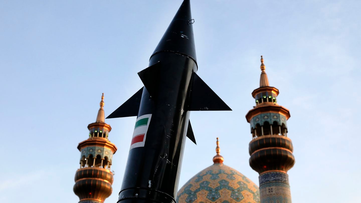 A model of a missile is carried by Iranian demonstrators during an anti-Israeli gathering at the Felestin (Palestine) Square in Tehran, Iran, Monday, April 15, 2024. (Vahid Salemi/AP)