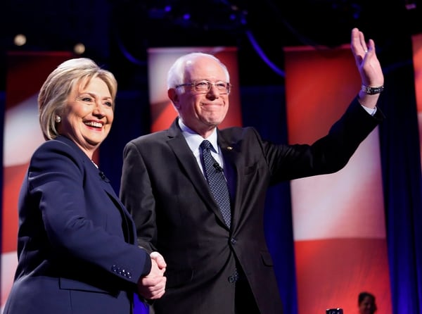 Democratic presidential candidates Hillary Clinton, left, and Sen. Bernie Sanders, I-Vt, pose for a photo before debating at the University of New Hampshire Thursday, Feb. 4, 2016, in Durham, N.H. (AP Photo/Jim Cole)