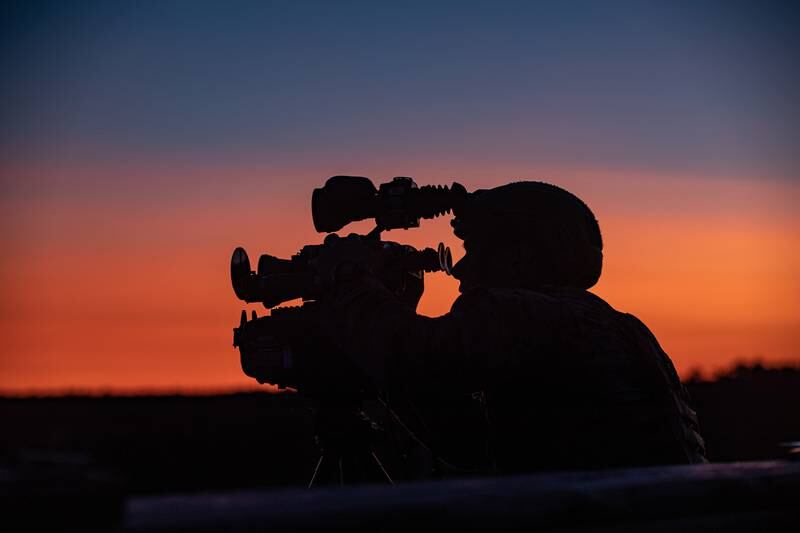 Marine Corps Staff Sgt. Brock Legant, an instructor at Scout Sniper Instructor School, rehearses his skills on night observation equipment during Tactical Air Control Party 1-21 on Camp Lejeune, N.C., Nov. 3, 2020.