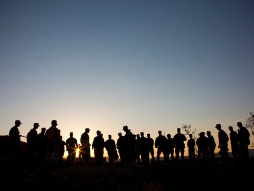 Marines gather for a sunset brief at Marine Corps Air Ground Combat Center Twentynine Palms in California on May 25, 2016. (Staff Sgt. Gabriela Garcia/Marine Corps)
