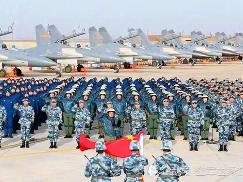 On display during a People's Liberation Army Air Force parade are Shenyang J-16s, foreground, and J-11Bs, background. (China's Ministry of National Defense)