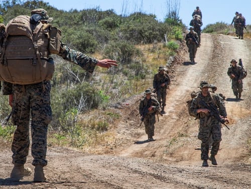 A squad from Alpha company tactically moves from station to station as part of the capstone exercise for the Infantry Marine Course on Marine Corps Base Camp Pendleton, California, April 29. (Sgt. Jeremy Laboy/Marine Corps)
