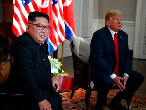 President Donald Trump meets with North Korean leader Kim Jong Un on Tuesday on Sentosa Island, Singapore. (Evan Vucci/AP)
