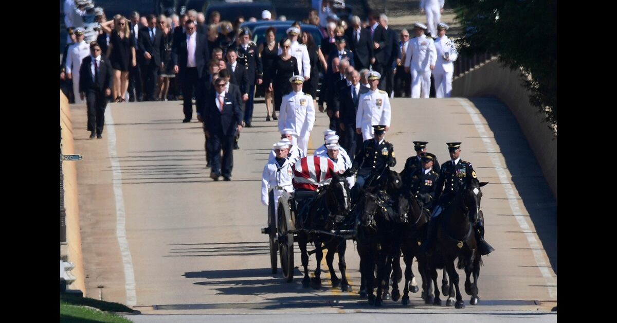 McCain buried at Naval Academy alongside a longtime friend